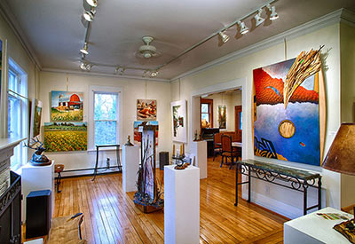 interior of art gallery with modern art on walls