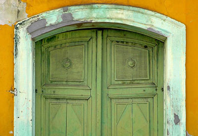 photo of green doors on old building