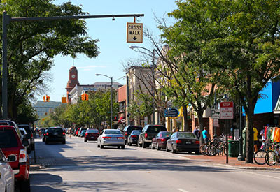 downtown Traverse City with cars and shops